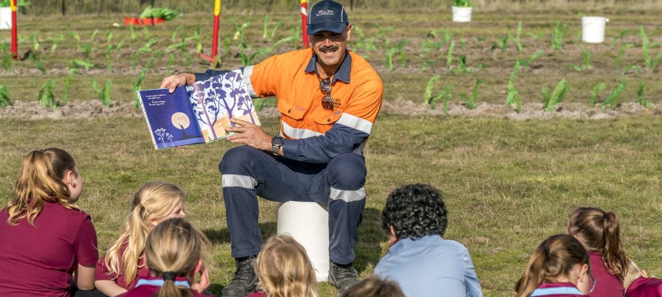 Tree planting and story time for local students